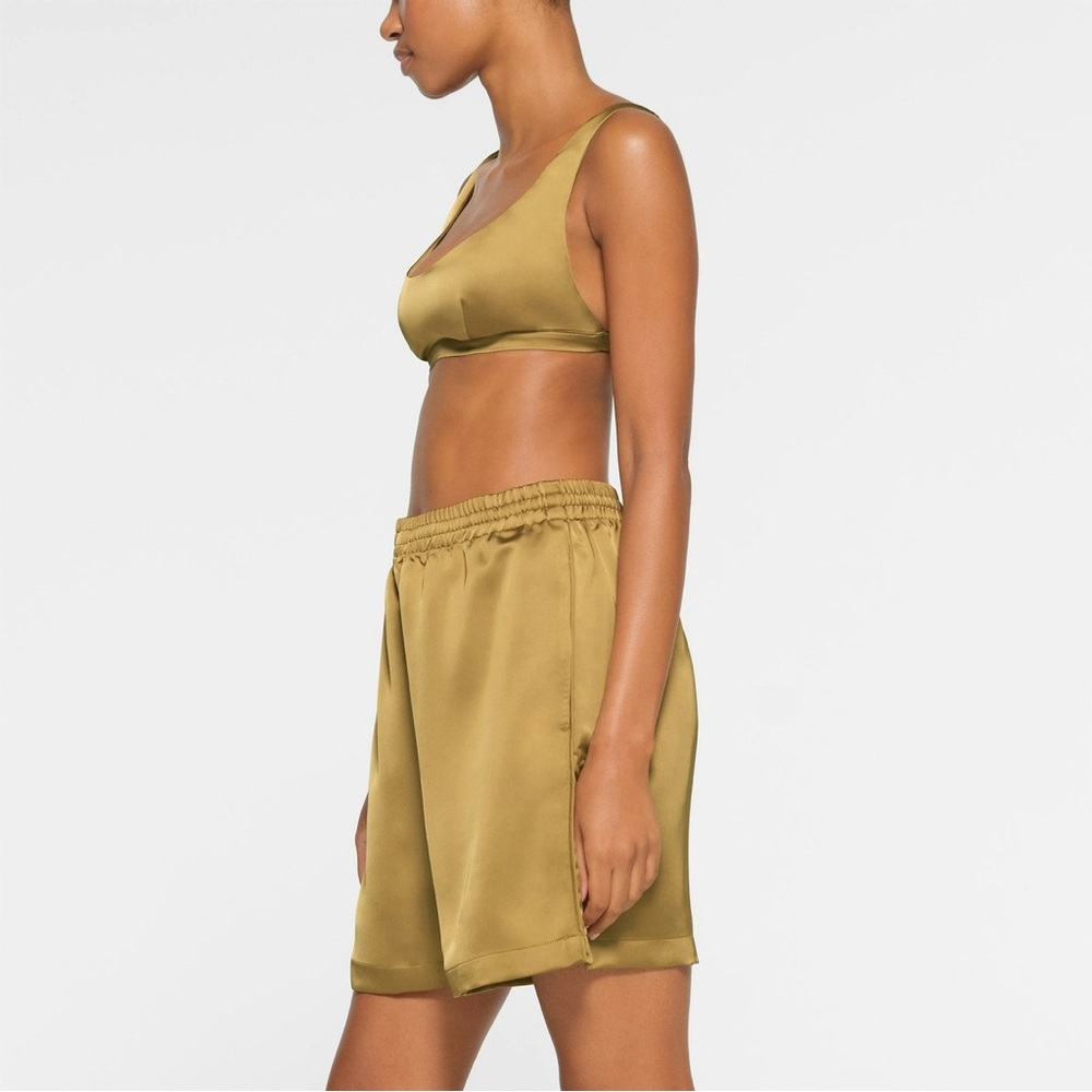 SKIMS Gold Athletic Shorts